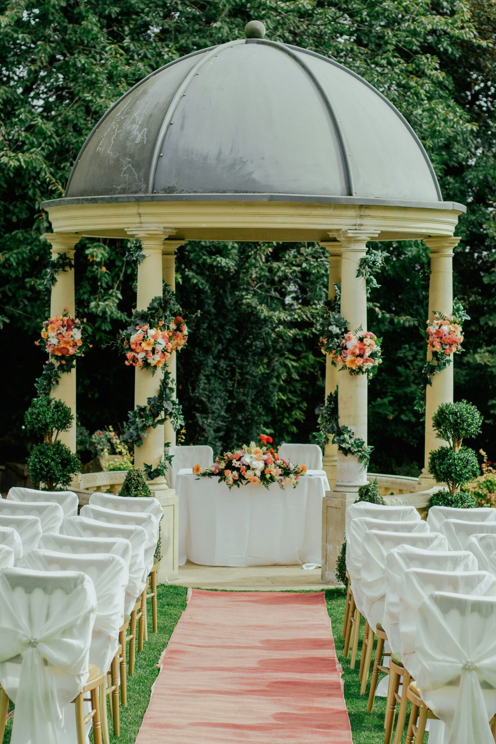 Garden gazebo wedding venue set for a ceremony