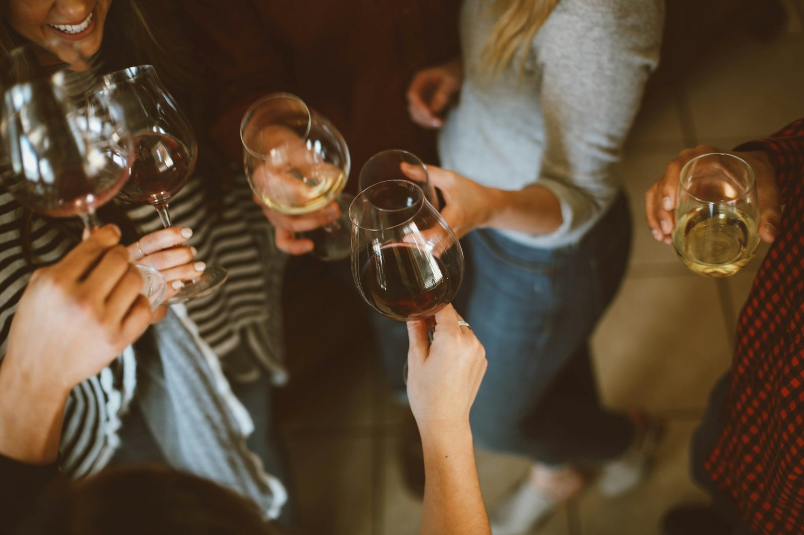 Wedding guests raising their glasses in a toast